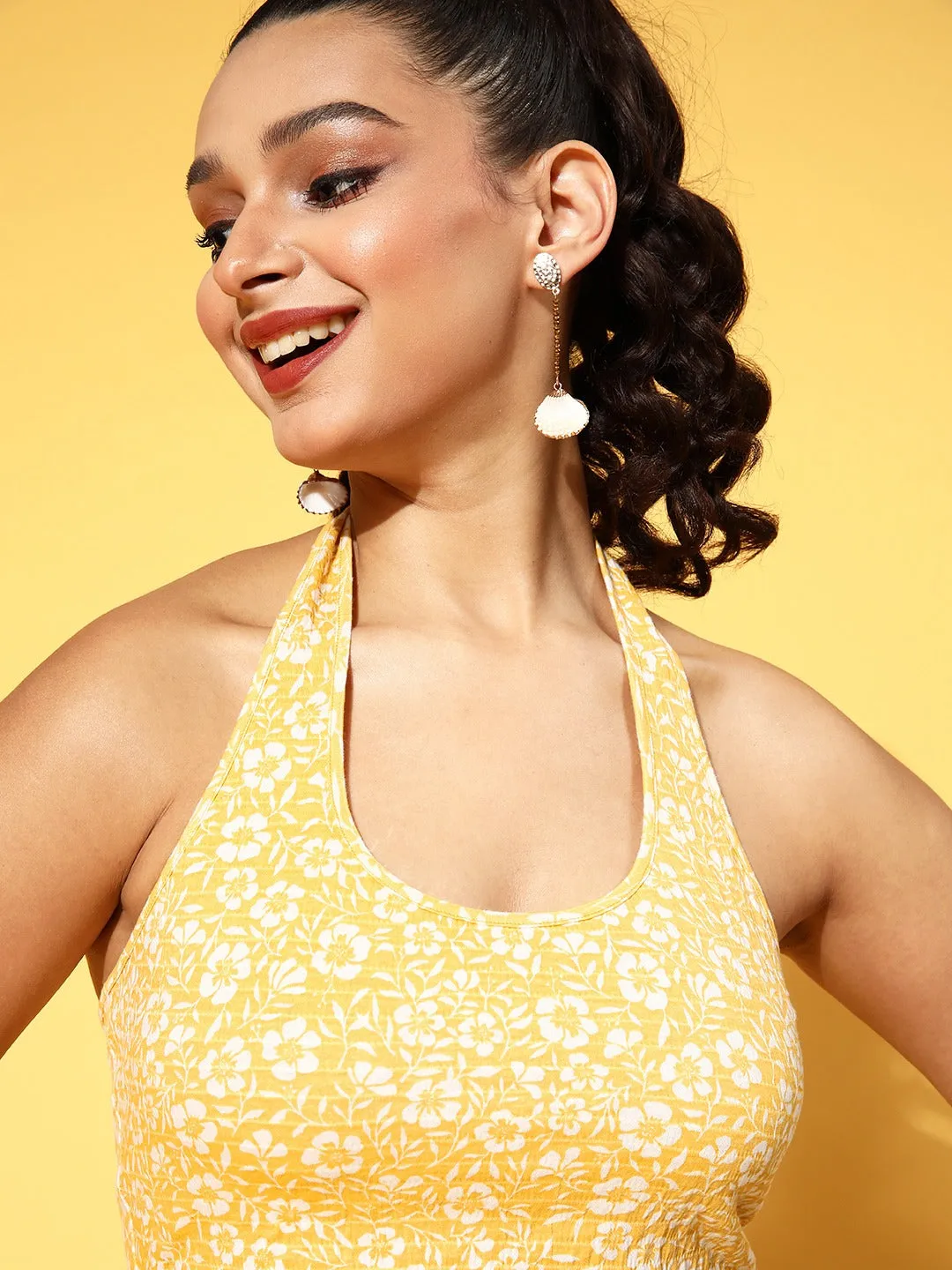 Berrylush Women Yellow Floral Printed Halter Neck Sleeveless Cropped Top